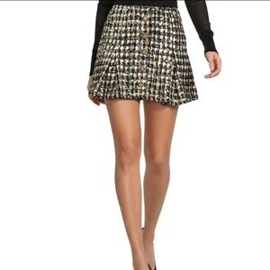 A loves a Metallic Houndstooth High Rise Pleated A-Line Mini Skirt